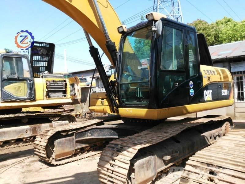 CAT 323 D L Rupsgraafmachines
