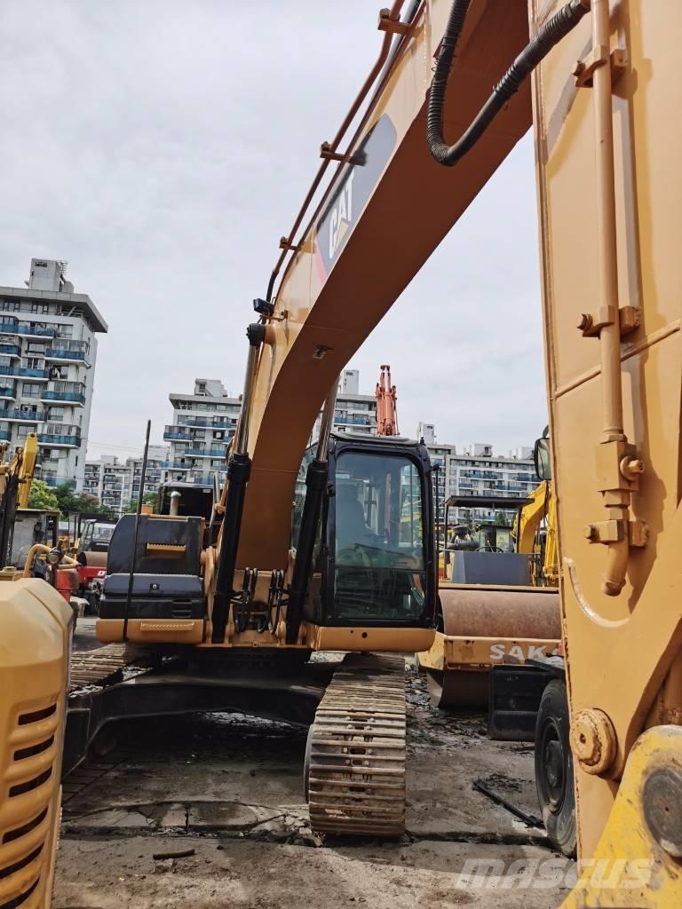CAT 323D Rupsgraafmachines