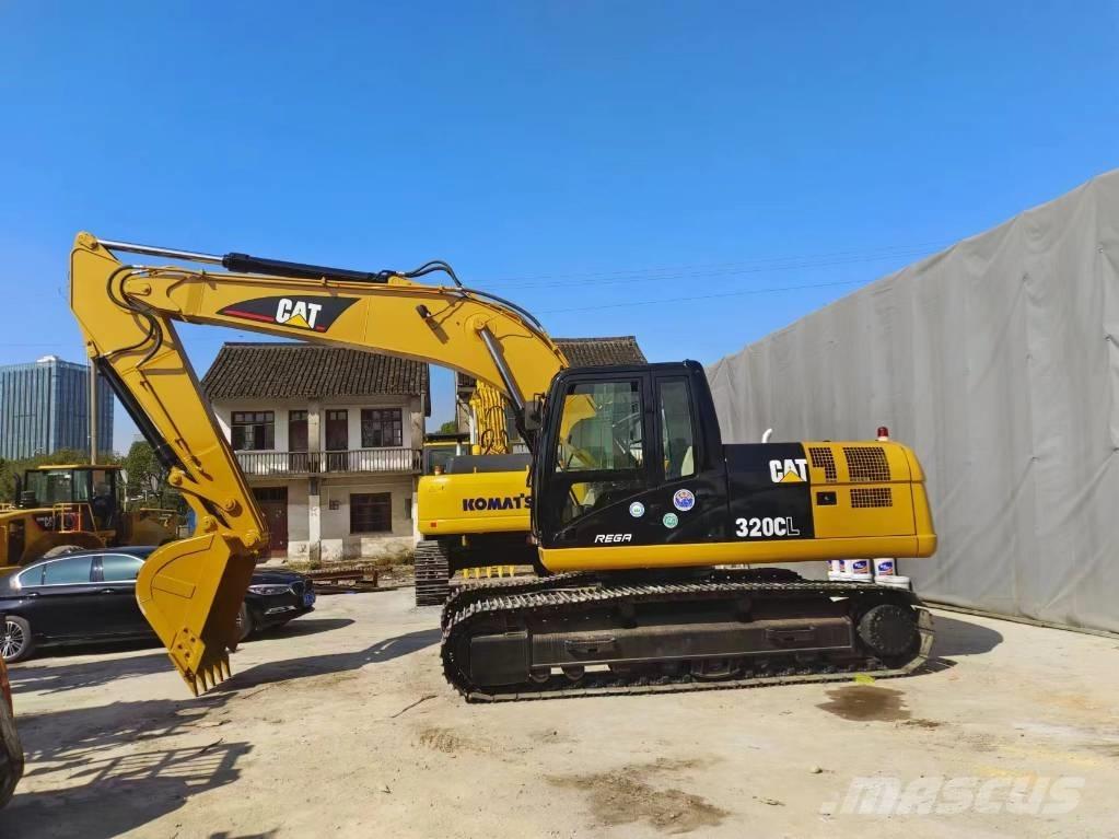 CAT 320 Rupsgraafmachines