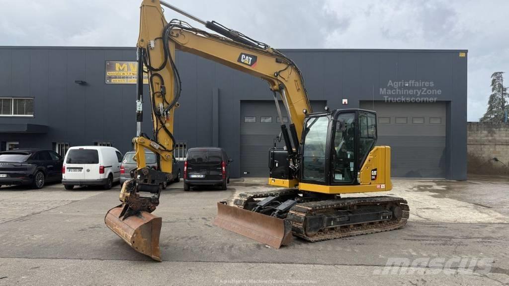CAT 310 Rupsgraafmachines