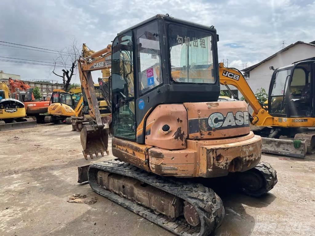 CASE CX 58 C Rupsgraafmachines