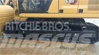 CAT 2022 CAT 323GC Wielgraafmachines