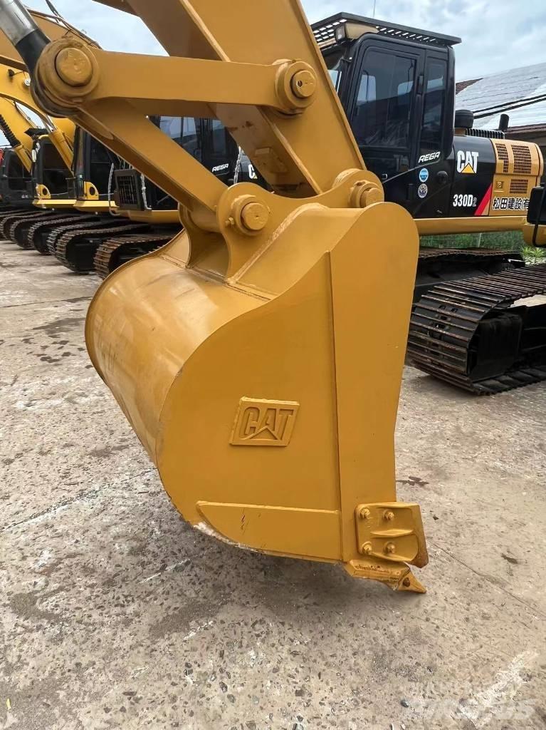 CAT 320 Rupsgraafmachines