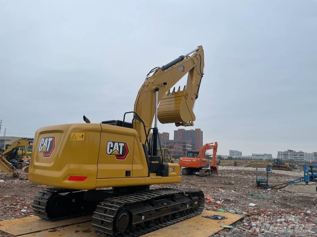 CAT 323GC Rupsgraafmachines
