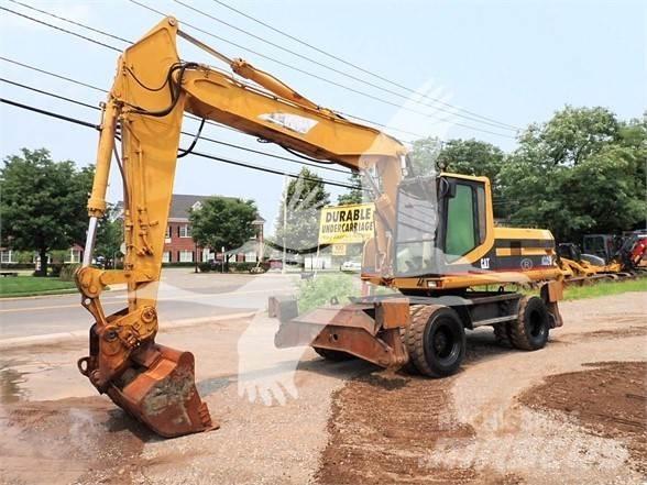 CAT M320 Wielgraafmachines