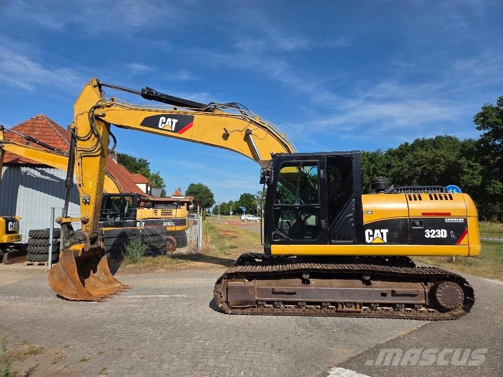 CAT 323DL Rupsgraafmachines