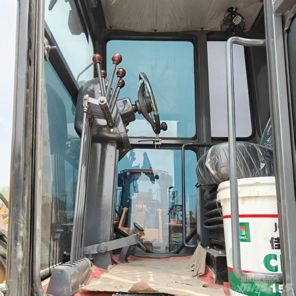 CAT 140 H Rupsgraafmachines