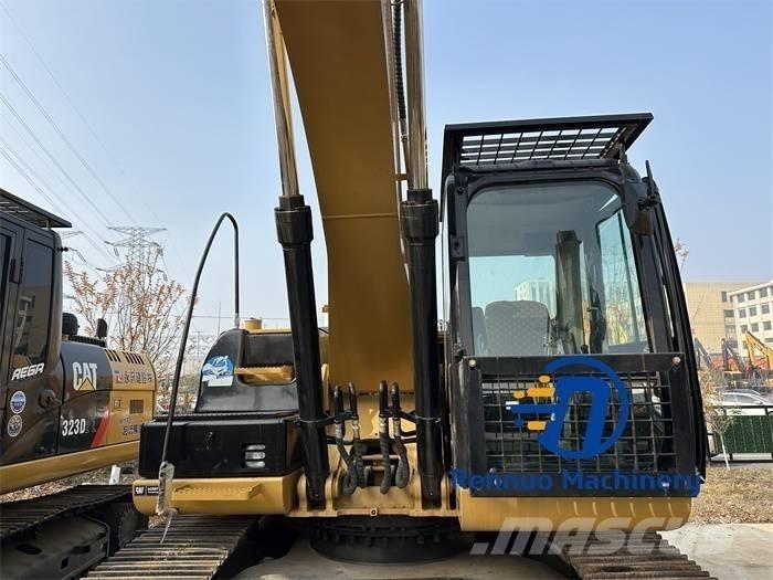 CAT 323D/323/323DL Rupsgraafmachines