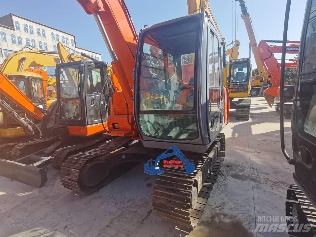 Hitachi EX60 Minigraafmachines < 7t