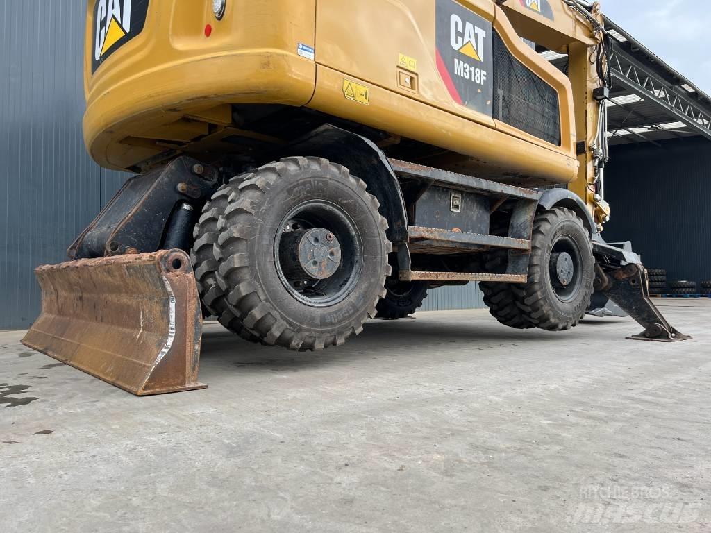 CAT M318F Wielgraafmachines