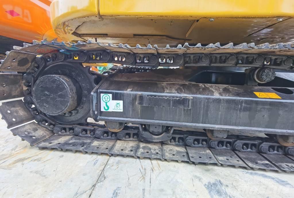 CAT 310 Rupsgraafmachines