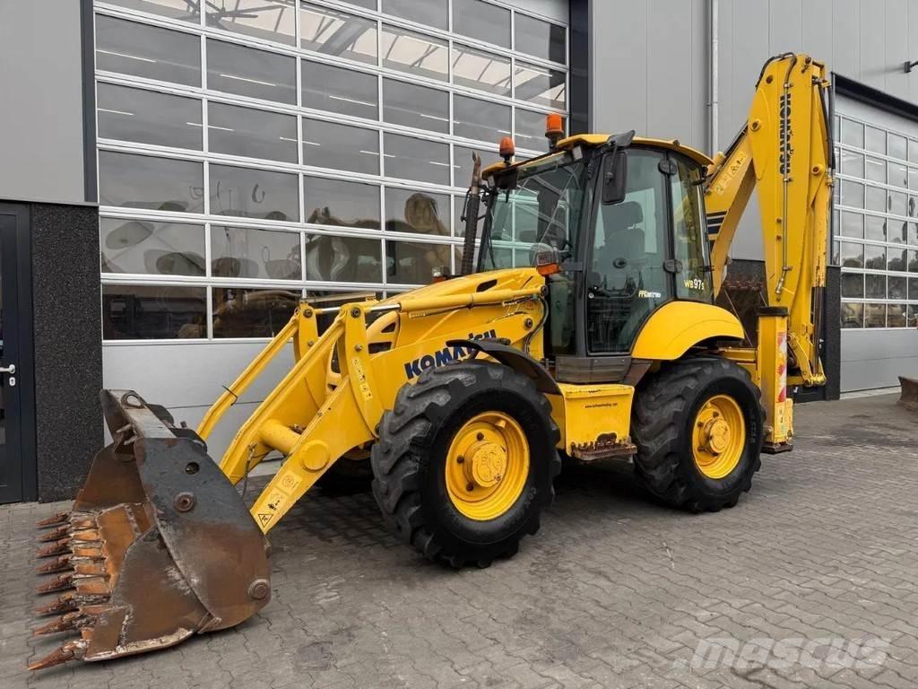 Komatsu WB97S | A/C Graaf-laadcombinaties