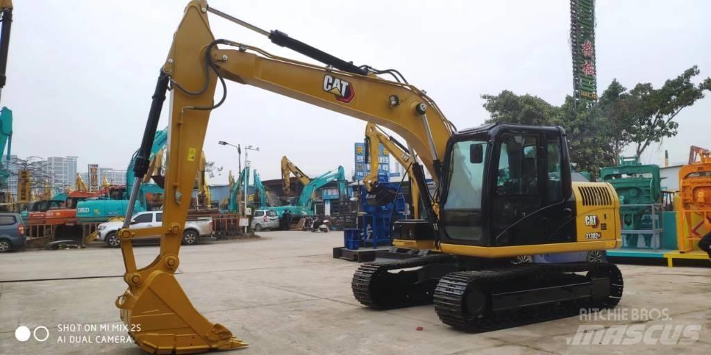 CAT 2021 CAT 313D2GC Wielgraafmachines