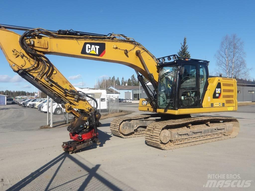 CAT 323 Rupsgraafmachines