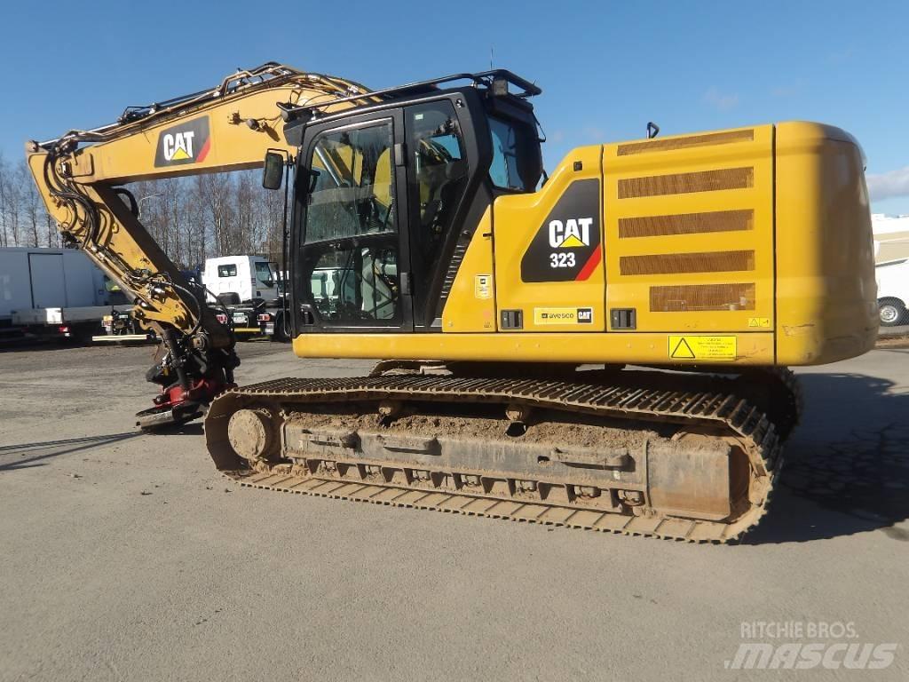 CAT 323 Rupsgraafmachines