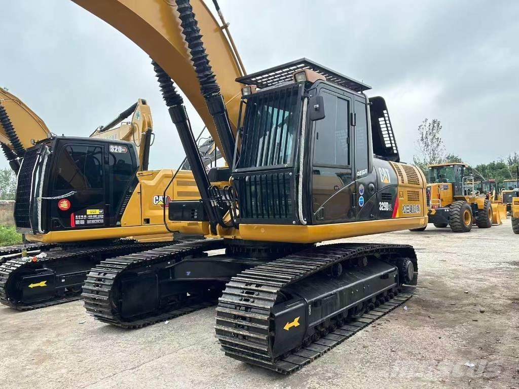 CAT 329 Rupsgraafmachines