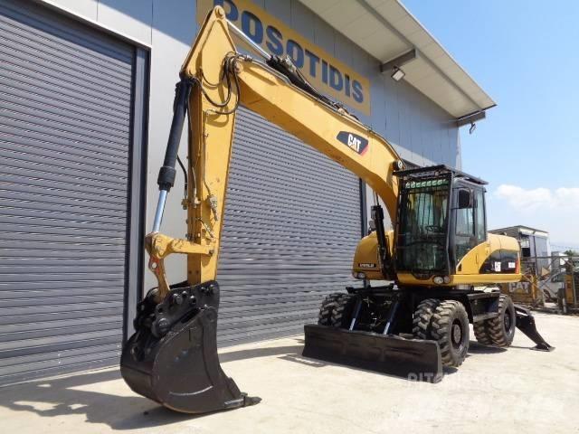 CAT M 318 D Wielgraafmachines