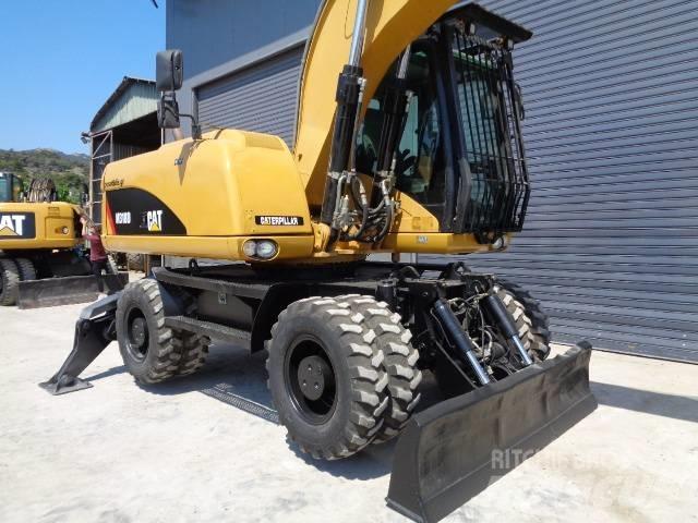 CAT M 318 D Wielgraafmachines