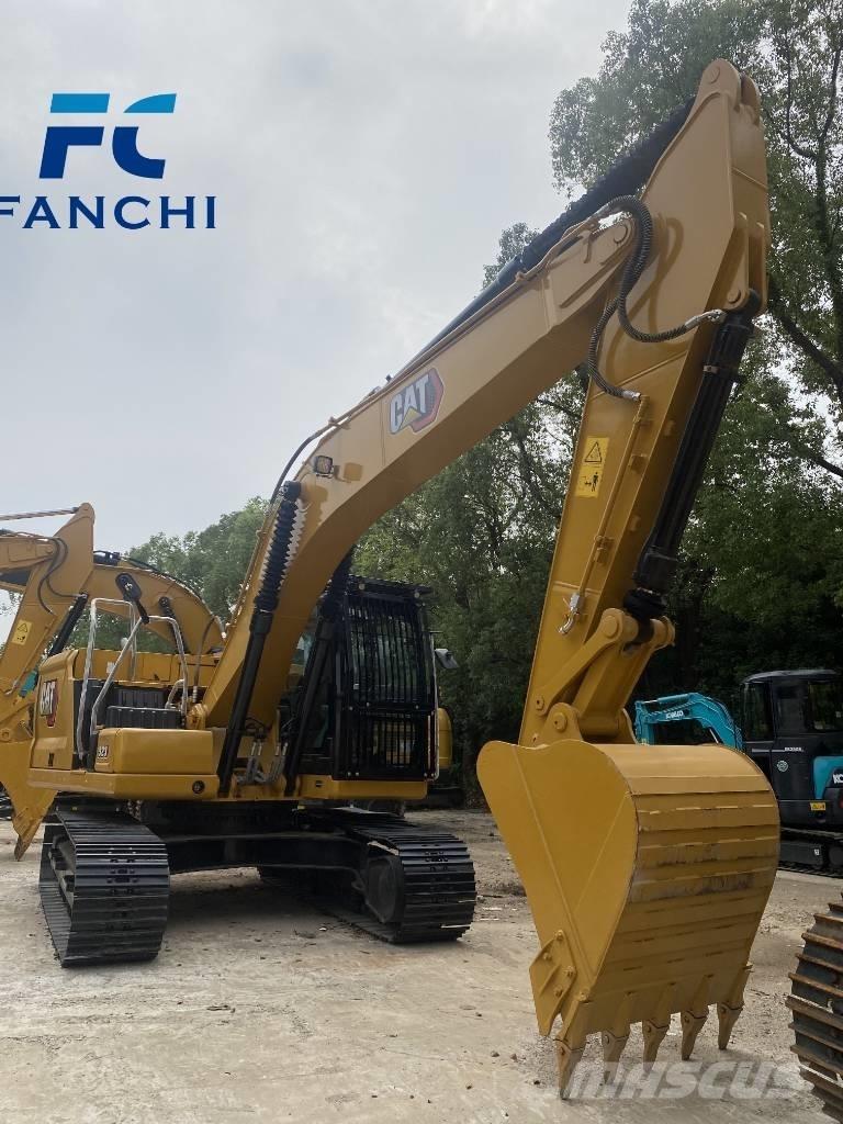 CAT 323 Rupsgraafmachines