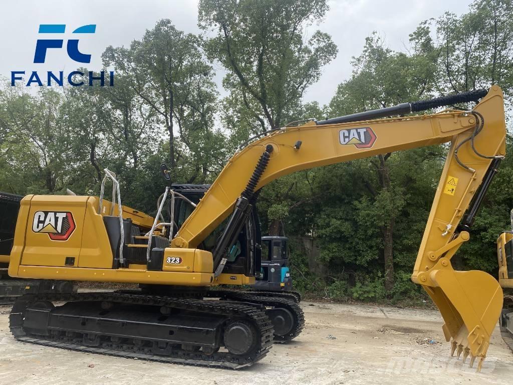 CAT 323 Rupsgraafmachines