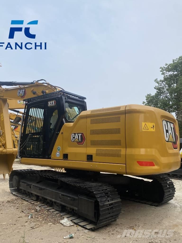 CAT 323 Rupsgraafmachines