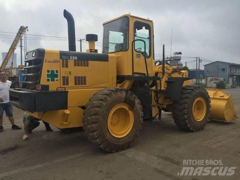 Komatsu WA 320 Graaf-laadcombinaties