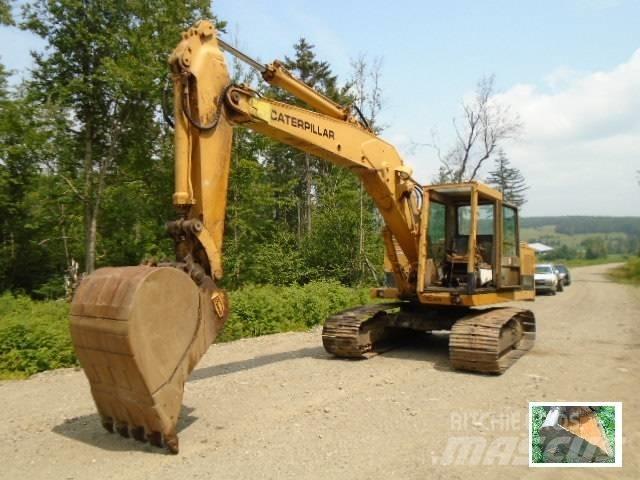 CAT 215 Rupsgraafmachines
