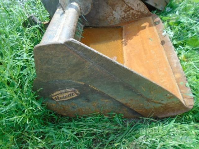 CAT 215 Rupsgraafmachines