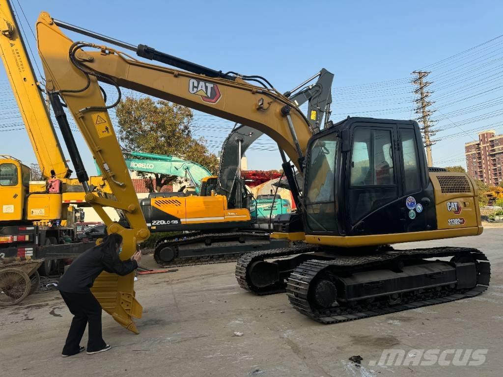 CAT 313 D Rupsgraafmachines