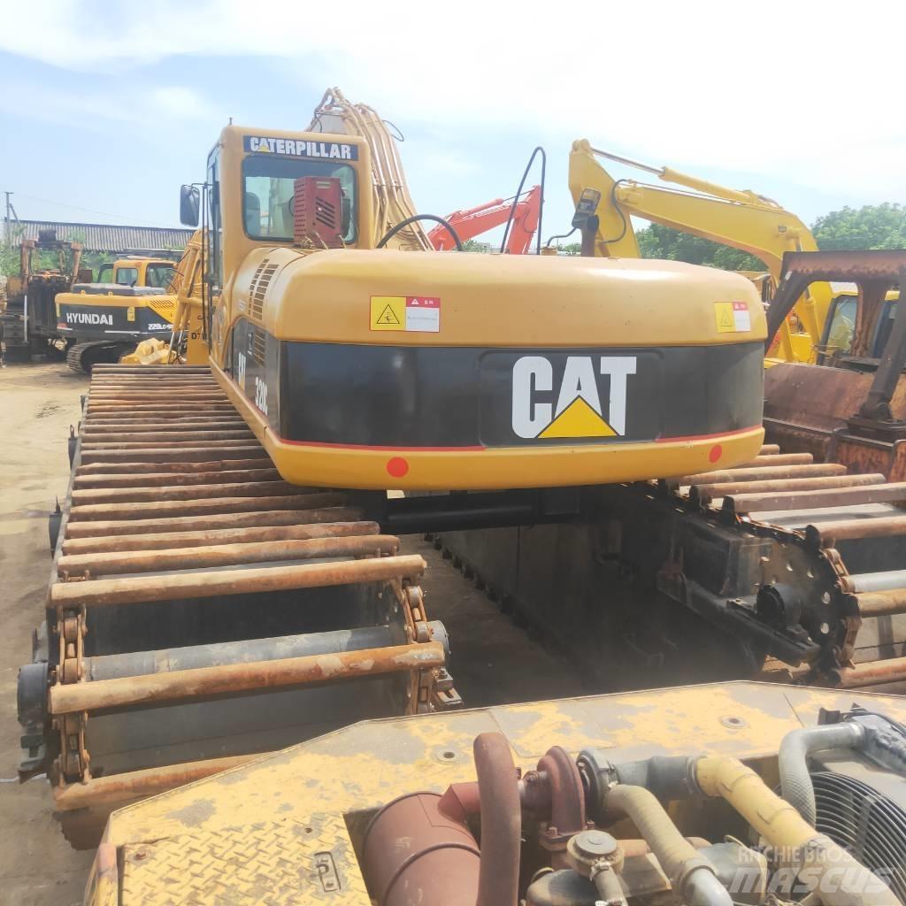 CAT 320C Amfibische graafmachines