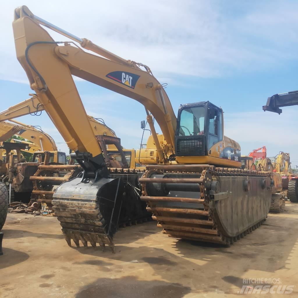 CAT 320C Amfibische graafmachines