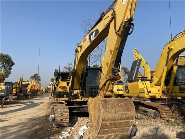 CAT 318D Rupsgraafmachines