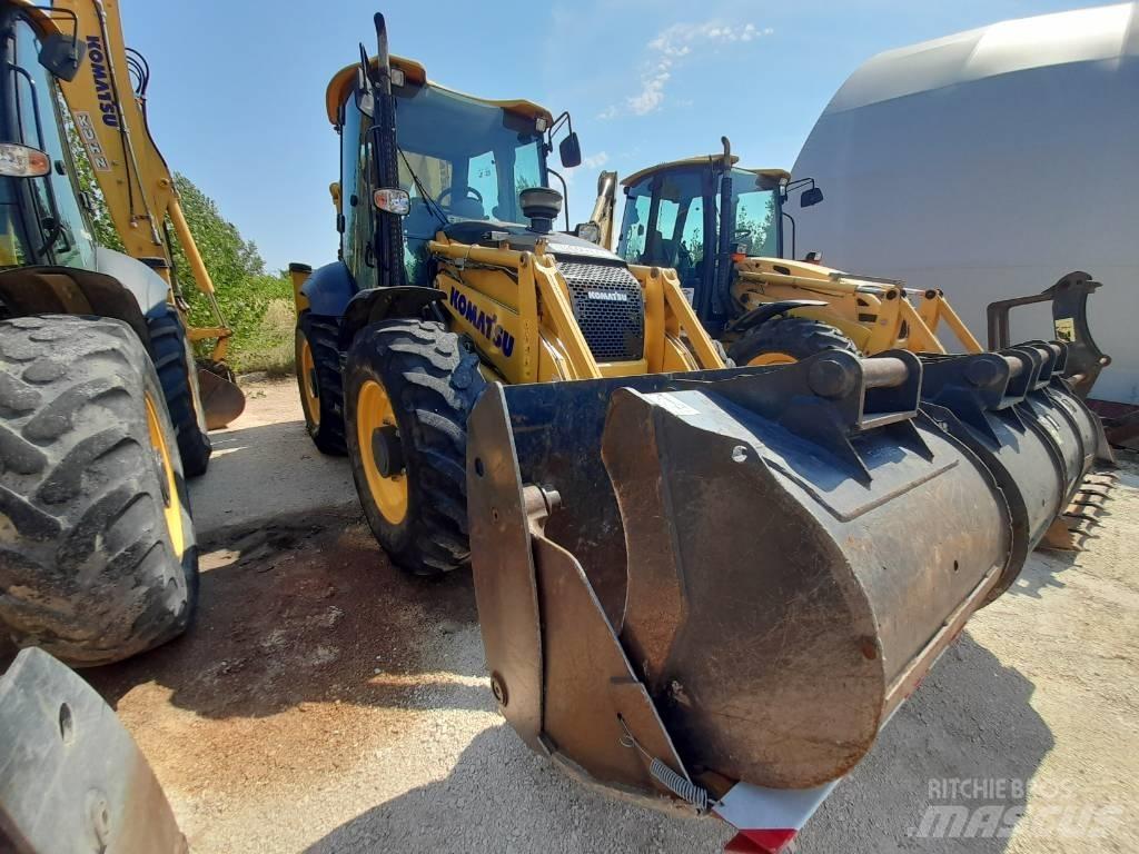 Komatsu WB97S-8 Graaf-laadcombinaties