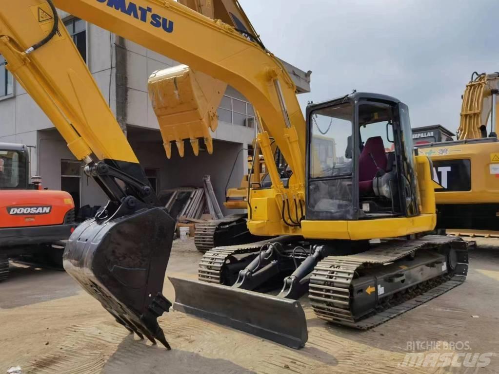 Komatsu PC 128US Midigraafmachines 7t - 12t