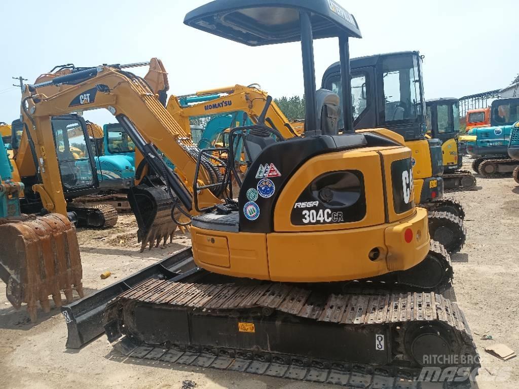 CAT 304 C Rupsgraafmachines