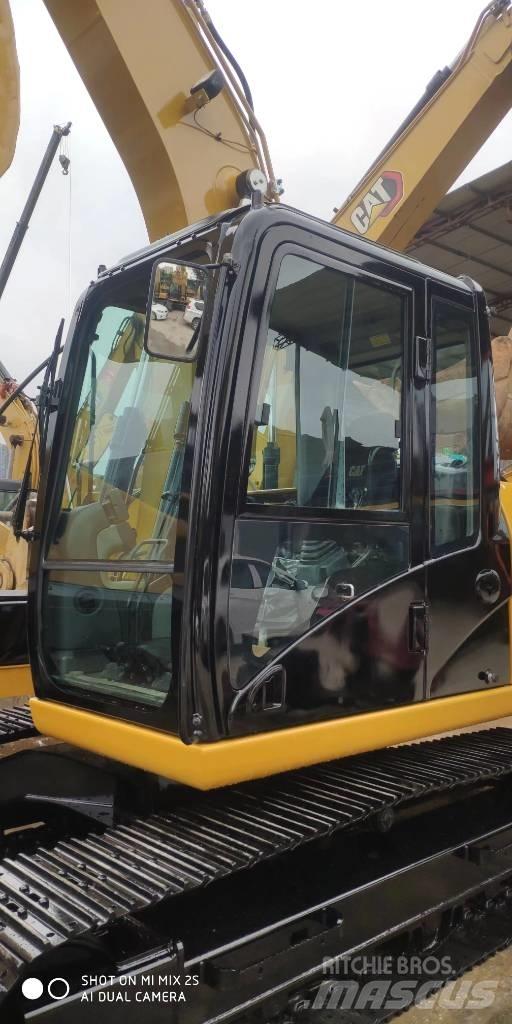 CAT 2021 CAT 313D2GC Wielgraafmachines