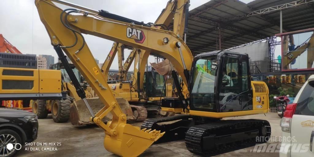 CAT 2021 CAT 313D2GC Wielgraafmachines