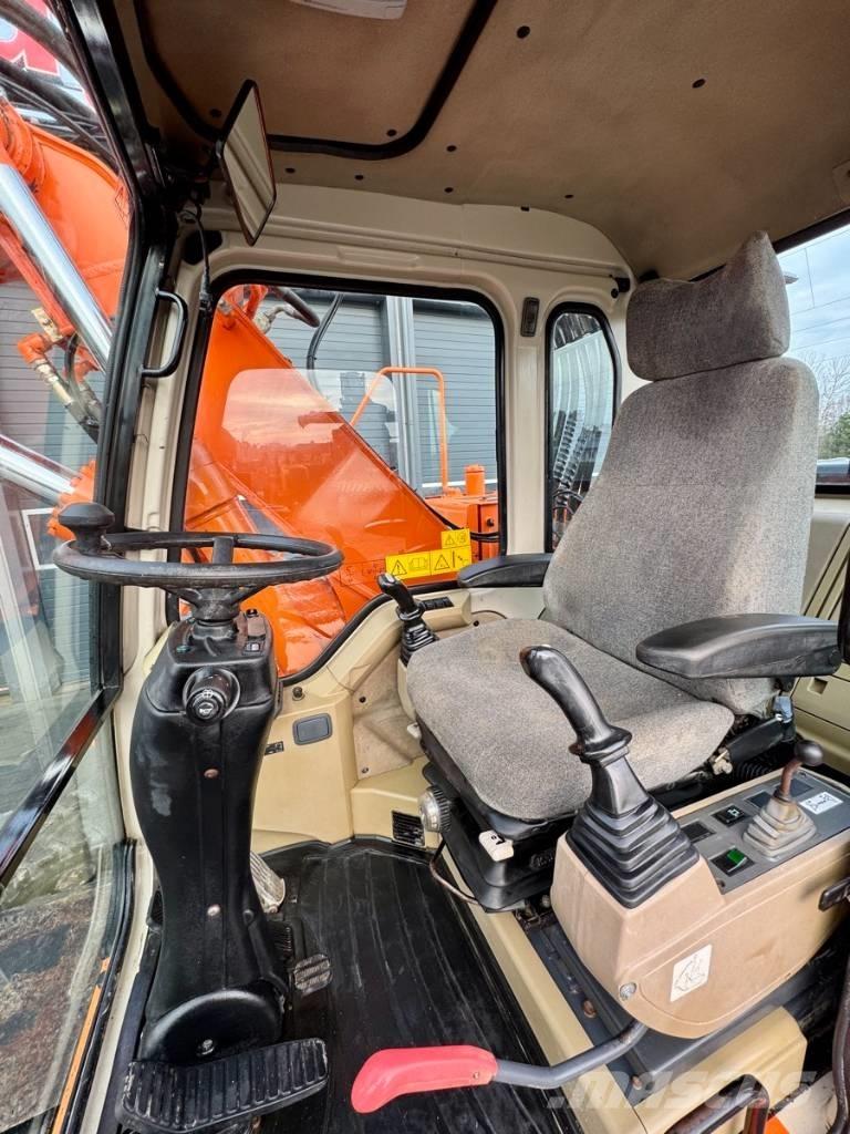 Doosan SOLAR 140W-V Wielgraafmachines