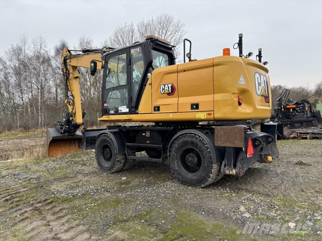 CAT M 318 Wielgraafmachines