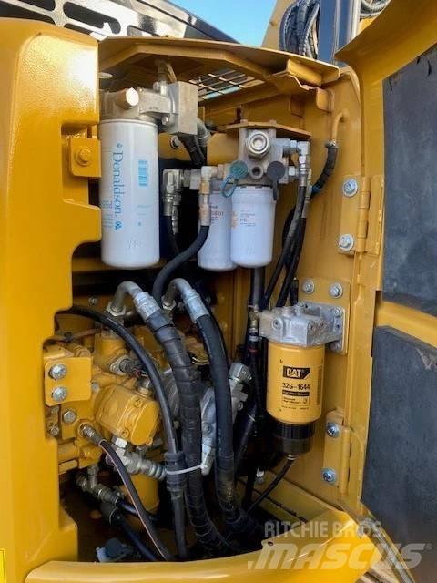 CAT 313 Rupsgraafmachines