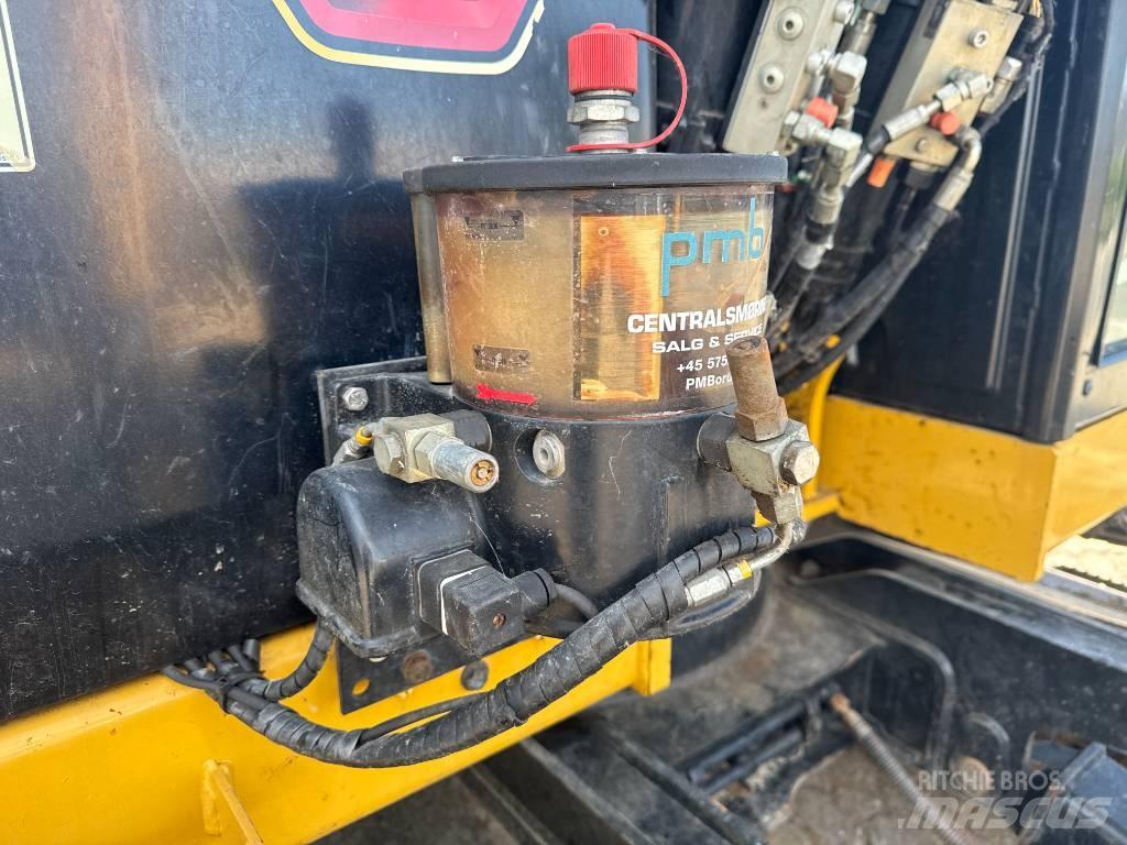 CAT 310 Rupsgraafmachines