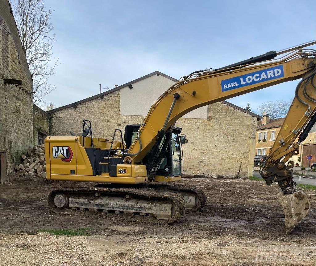 CAT 323 Rupsgraafmachines