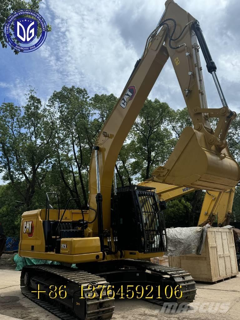CAT 323 Rupsgraafmachines