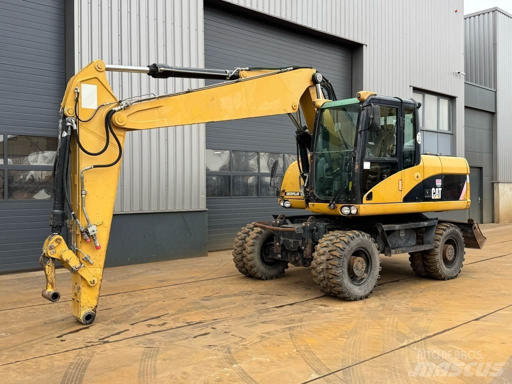 CAT M315D Wielgraafmachines