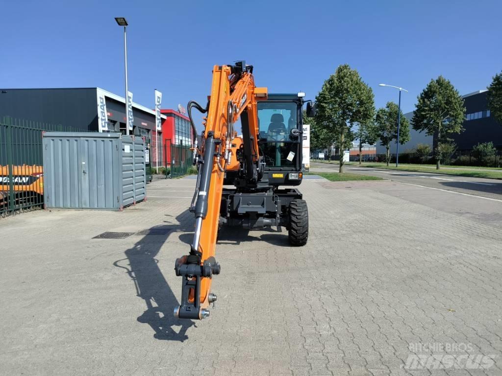 Develon DX57W-7 Minigraafmachines < 7t