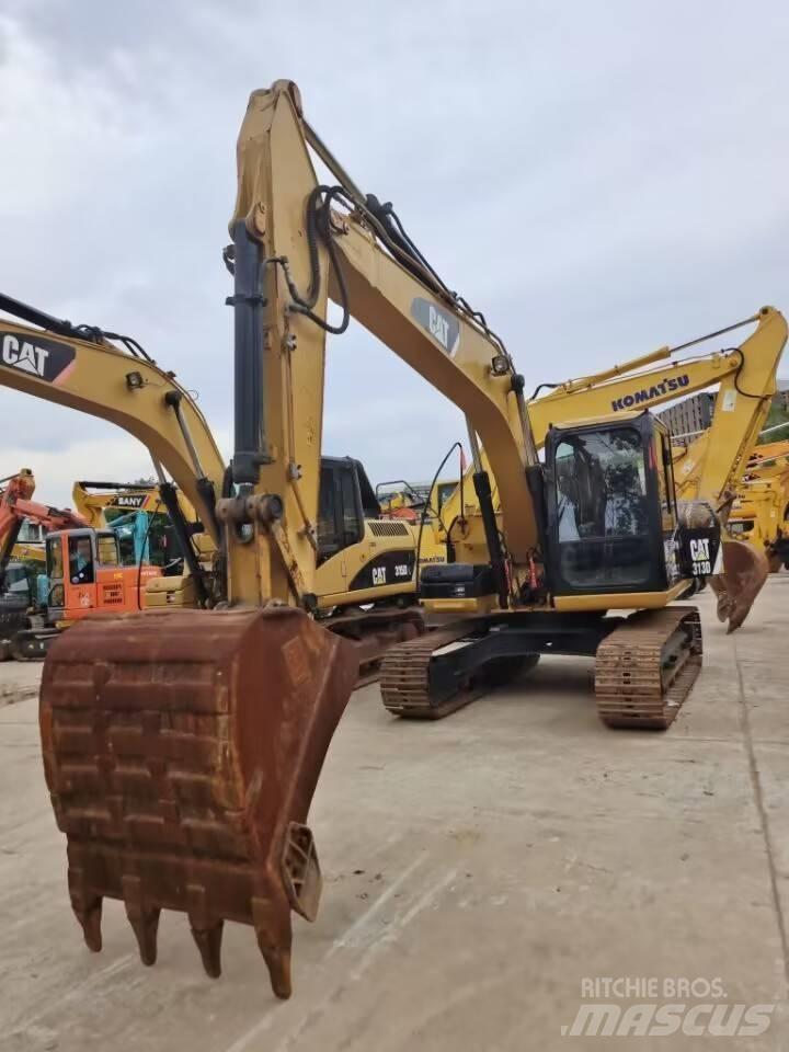 CAT 313 D Rupsgraafmachines