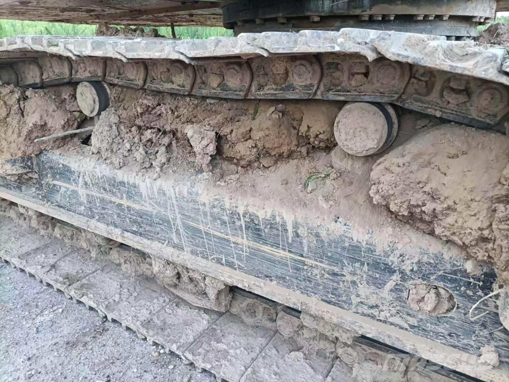 CAT 323GX Amfibische graafmachines