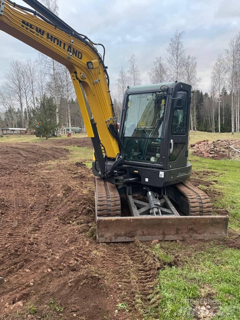 New Holland E60C Minigraafmachines < 7t