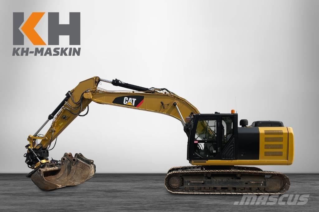 CAT 323 F Rupsgraafmachines