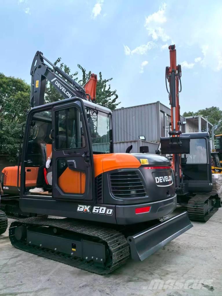 Develon DX 60 D Rupsgraafmachines